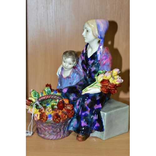 389 - A ROYAL DOULTON FIGURE GROUP 'THE LITTLE MOTHER' HN1399, formerly known as The Young Widow, printed,... 