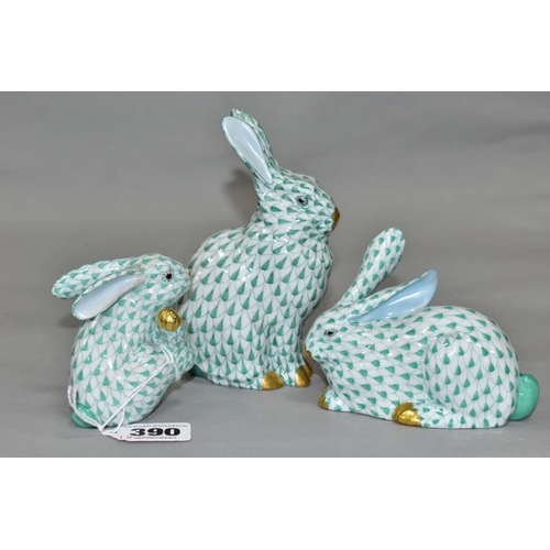 390 - THREE HEREND RABBITS, all with green and white decoration, all modelled in different poses, tallest ... 