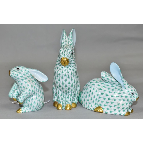 390 - THREE HEREND RABBITS, all with green and white decoration, all modelled in different poses, tallest ... 