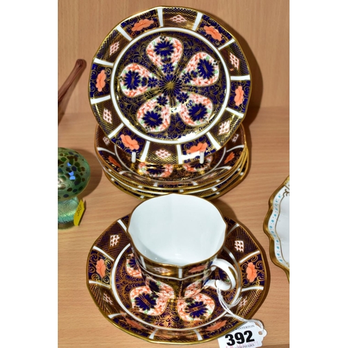 392 - A SET OF SIX ROYAL CROWN DERBY IMARI 1128 SAUCERS AND A CUP, printed and impressed marks, all first ... 