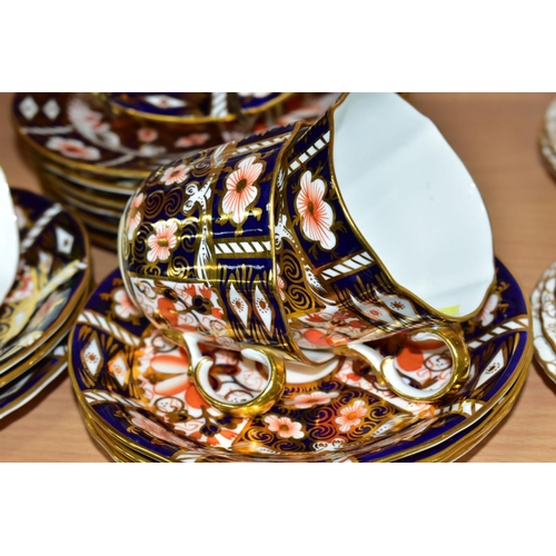 396 - A ROYAL CROWN DERBY IMARI 2451 PATTERN PART TEA SET, comprising three cups, six saucers and seven te... 