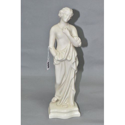 400 - A MID 20TH CENTURY BELLEEK FIGURE OF AFFECTION, a scantily clad lady wearing a string of pearls, mod... 