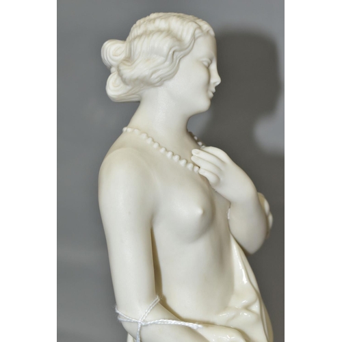 400 - A MID 20TH CENTURY BELLEEK FIGURE OF AFFECTION, a scantily clad lady wearing a string of pearls, mod... 