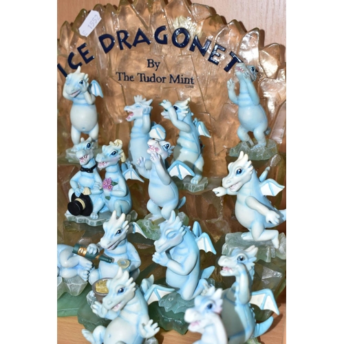 403 - A TUDOR MINT 'ICE DRAGONETS' DISPLAY STAND AND SEVENTEEN DRAGON FIGURES, including Greedy Guts, two ... 