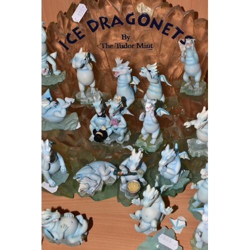 403 - A TUDOR MINT 'ICE DRAGONETS' DISPLAY STAND AND SEVENTEEN DRAGON FIGURES, including Greedy Guts, two ... 