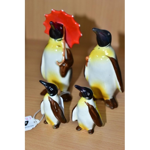 405 - A BESWICK PENGUIN FAMILY, comprising Penguin with Umbrella no 802, Penguin with walking stick no 803... 