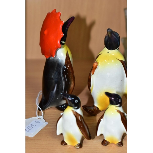 405 - A BESWICK PENGUIN FAMILY, comprising Penguin with Umbrella no 802, Penguin with walking stick no 803... 