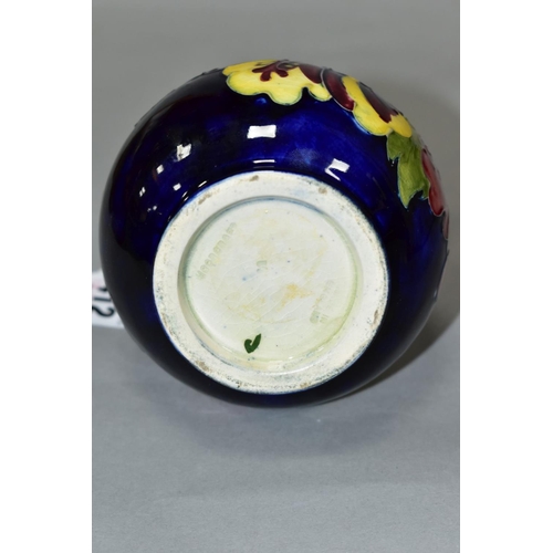 412 - A MOORCROFT POTTERY SQUAT BALUSTER VASE, yellow and red hibiscus on a blue ground, impressed marks, ... 