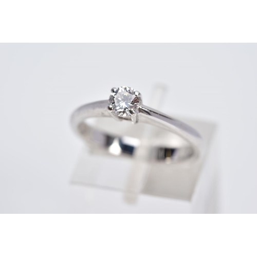 50 - AN 18CT WHITE GOLD SINGLE STONE DIAMOND RING, the claw set round brilliant cut diamond within a rais... 