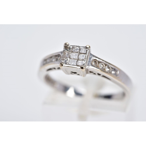 52 - AN 18CT WHITE GOLD DIAMOND RING, designed with a central raised square panel set with nine princess ... 