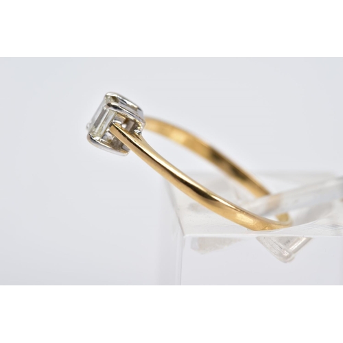 56 - AN 18CT GOLD SINGLE STONE DIAMOND RING, designed with a claw set rectangular cut diamond, tapered sh... 