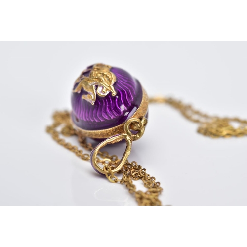 61 - A SILVER GILT PENDANT NECKLET, the pendant in the form of an egg with purple guilloche enamel and a ... 