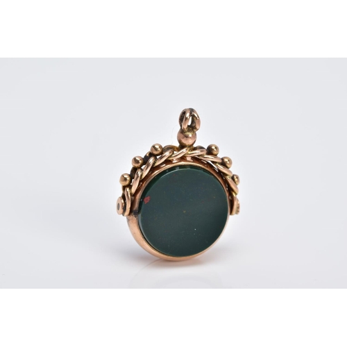 62 - A 9CT GOLD SWIVEL FOB, of circular design swivels to reveal bloodstone and carnelian panels, to a be... 