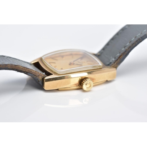 63 - A LADIES 9CT GOLD OMEGA WRISTWATCH, of a square shape, gold tone dial signed 'Omega', baton markers,... 