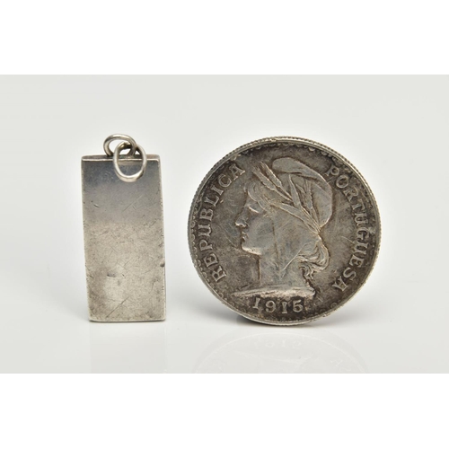 76 - A SILVER INGOT PENDANT AND A COIN, the ingot decorated with a foliate design hallmarked Birmingham 1... 