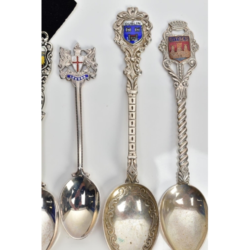 83 - EIGHT ENGLISH AND CONTINENTAL COLLECTABLE SILVER TEASPOONS, of various designs such as a London embl... 