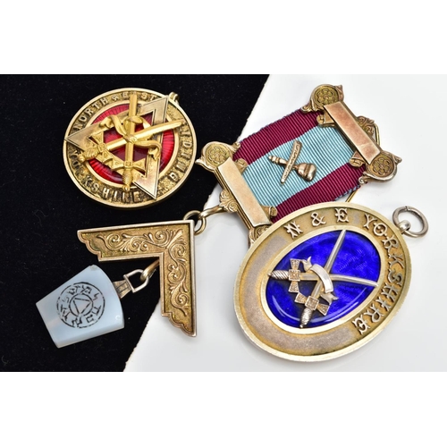 92 - A MASONIC MEDAL AND TWO MASONIC PENDANTS, the gilt metal and silver gilt medal, fitted on a burgundy... 