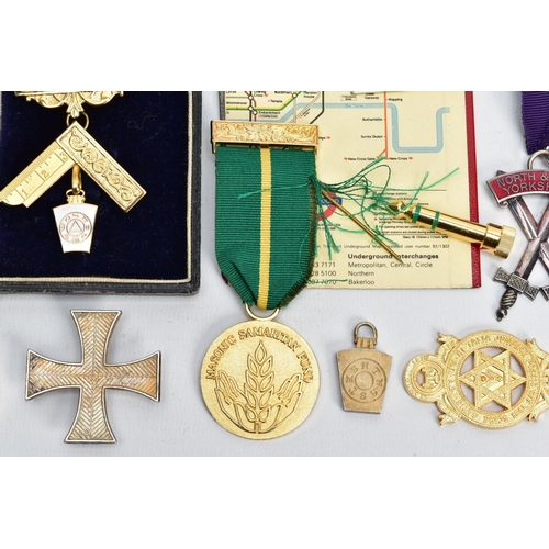 94 - AN ASSORTMENT OF MASONIC RELATED ITEMS, to include a cased breast pin medal on a burgundy and light ... 