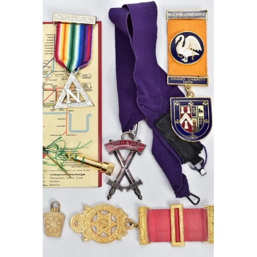 94 - AN ASSORTMENT OF MASONIC RELATED ITEMS, to include a cased breast pin medal on a burgundy and light ... 