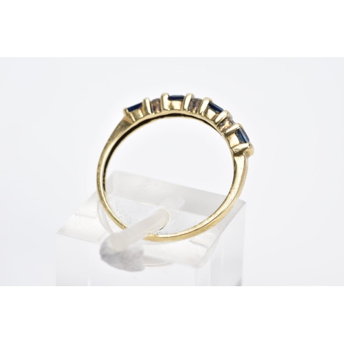 13 - A SAPPHIRE AND DIAMOND HALF HOOP RING, the yellow metal ring designed with a row of four-square cut ... 