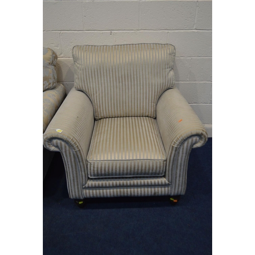 1350 - AN UPHOLSTERED TWO PIECE LOUNGE SUITE, on turned front legs, comprising a gold floral upholstered th... 