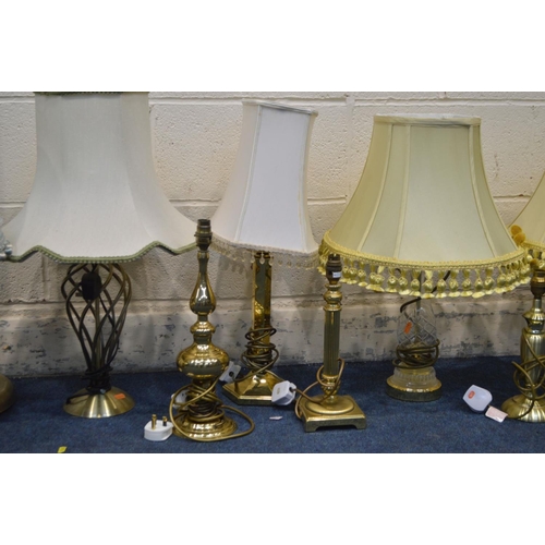 1351 - A QUANTITY OF MODERN LIGHTING, to include a pair of brassed uplighters, and eleven various brassed t... 