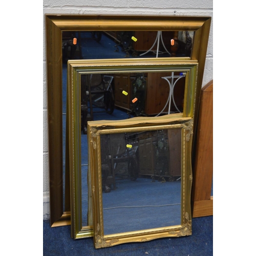 1353 - A MODERN GILT FRAMED WALL MIRROR, 119cm x 94cm, four various other wall mirrors and a modern threefo... 