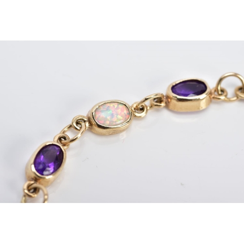 15 - A 9CT GOLD LINE BRACELET, designed with twelve oval links set with six oval cut amethyst and six ova... 