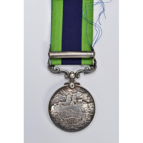 18 - A GEORGE V MEDAL WITH RIBBON, round medal of 'North West Frontier 1930-31 India' awarded to '4384811... 