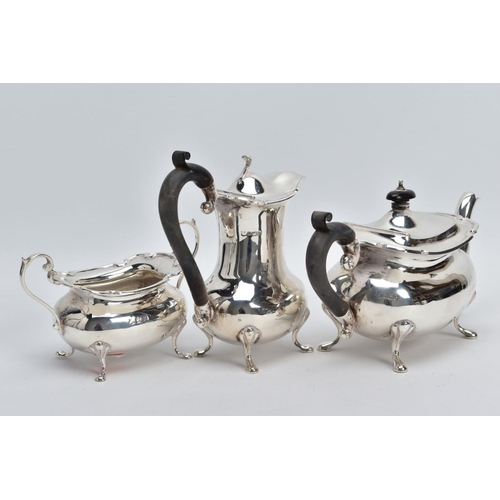 2 - A GEORGE V THREE PIECE SILVER TEA SERVICE SET, to include a teapot and coffee pot each with a plain ... 