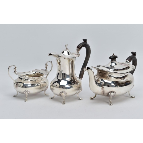 2 - A GEORGE V THREE PIECE SILVER TEA SERVICE SET, to include a teapot and coffee pot each with a plain ... 