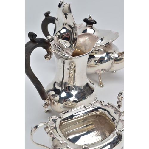 2 - A GEORGE V THREE PIECE SILVER TEA SERVICE SET, to include a teapot and coffee pot each with a plain ... 