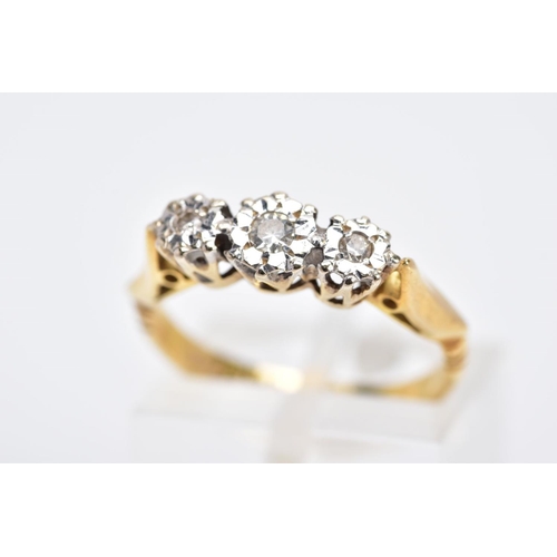 22 - A MID 20TH CENTURY THREE STONE DIAMOND RING, three round brilliant cut diamonds illusion set, estima... 