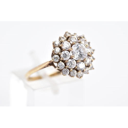 24 - A MODERN 9CT GOLD ROUND CLUSTER CUBIC ZIRCONIA RING, ring size R½, hallmarked 9ct gold, approximate ... 