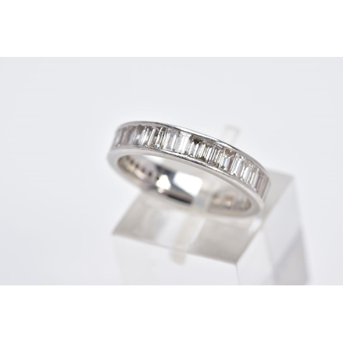 4 - A PLATINUM THREE QUARTER DIAMOND ETERNITY RING, set with a row of rectangular cut diamonds, total es... 