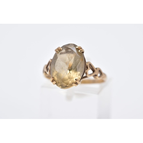 40 - A 9CT GOLD CITRINE SINGLE STONE RING, measuring approximately 14.0mm x 10.0mm, ring size O, hallmark... 