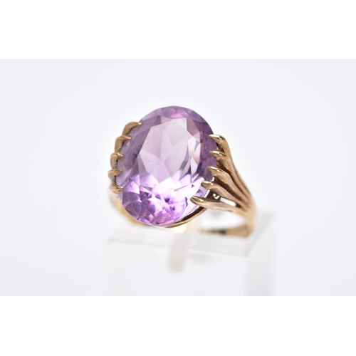 41 - A 9CT GOLD AMETHYST SINGLE STONE RING, amethyst measuring approximately 16.0mm x 12.0mm, ring size a... 