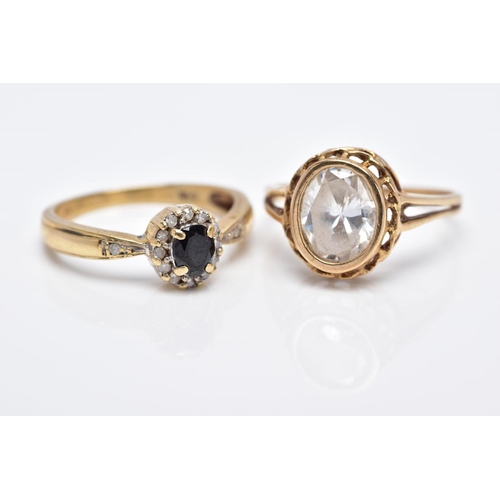 44 - TWO 9CT GOLD GEMSTONE RINGS, to include a sapphire and diamond small oval cluster ring, ring size M½... 