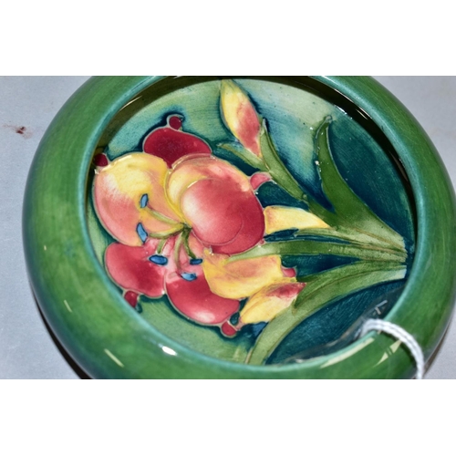 482 - A SHALLOW MOORCROFT LIPPED FREESIA PATTERN BOWL, impressed backstamps, diameter approximately 11cm (... 