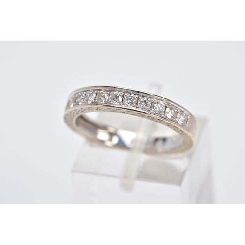 5 - AN 18CT WHITE GOLD DIAMOND HALF ETERNITY RING, designed with a row of round brilliant cut diamonds, ... 