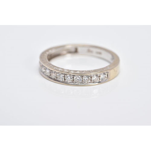 5 - AN 18CT WHITE GOLD DIAMOND HALF ETERNITY RING, designed with a row of round brilliant cut diamonds, ... 