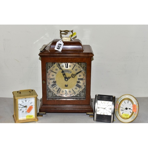 539 - A WUBA WARMINK WESTMINSTER CHIMING MANTEL CLOCK, the walnut finish George III style case, Roman and ... 