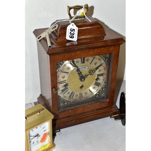 539 - A WUBA WARMINK WESTMINSTER CHIMING MANTEL CLOCK, the walnut finish George III style case, Roman and ... 