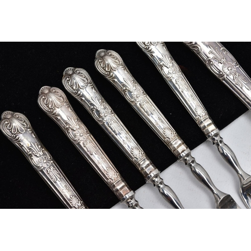 54 - A PAIR OF EDWARDIAN SILVER SUGAR TONGS, SET OF SIX SILVER HANDLED CAKE FORKS, A SILVER HANDLED BUTTE... 