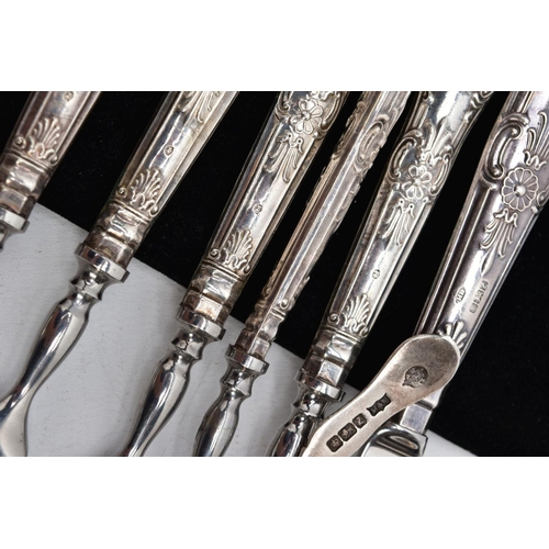 54 - A PAIR OF EDWARDIAN SILVER SUGAR TONGS, SET OF SIX SILVER HANDLED CAKE FORKS, A SILVER HANDLED BUTTE... 