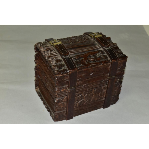 540 - A LATE 19TH CENTURY BLACK FOREST WOODEN CASKET IN THE FORM OF A TRUNK, with bark effect exterior bou... 