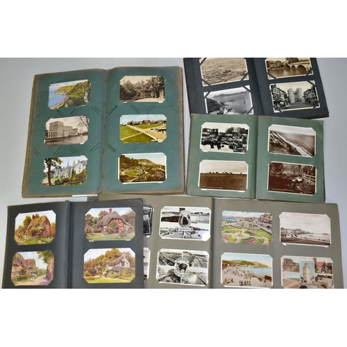 546 - POSTCARDS, five albums containing five hundred and twenty miscellaneous postcards featuring topograp... 