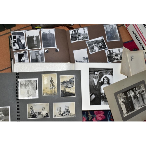 548 - PHOTOGRAPHS, a very large collection of family photographs (some framed) in one box and a suitcase, ... 