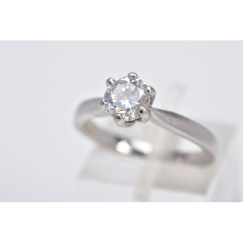 6 - A MODERN PLATINUM SINGLE STONE DIAMOND RING, estimated modern round brilliant cut diamond weight 0.9... 