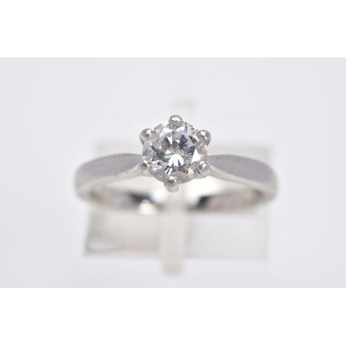 6 - A MODERN PLATINUM SINGLE STONE DIAMOND RING, estimated modern round brilliant cut diamond weight 0.9... 